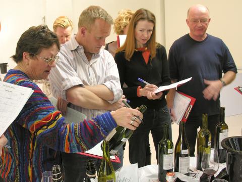 All is revealed. From left: judges Rosemary George, Olly Smith (behind), Tim Atkin (chair), Joanna Simon, Oz Clarke